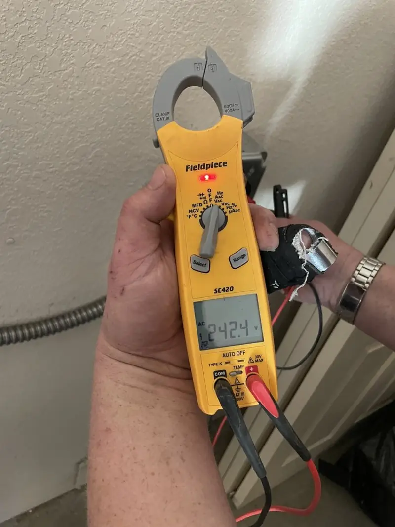 Voltage testing with clamp meter during Generator Installation in Newton